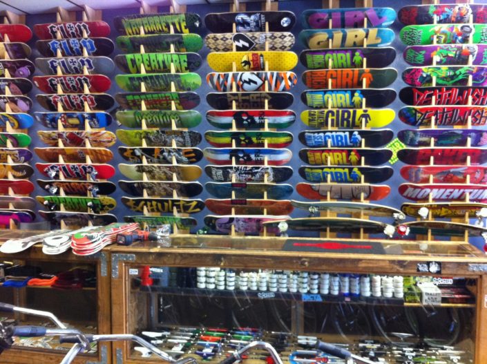 Skateboards on racks at momentum ride shop